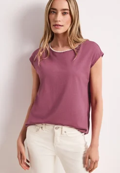 Shirt met overhangende schouder en decoratieve tape