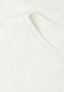 Shirt met boothals en decoratief detail