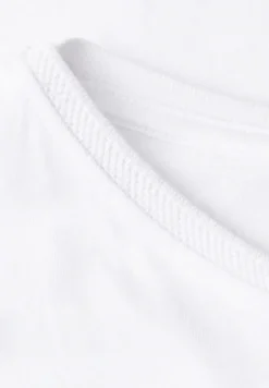 Shirt met boothals en decoratief detail