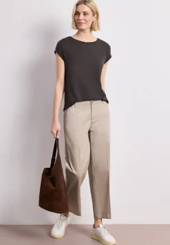 Shirt met boothals en decoratieve tape