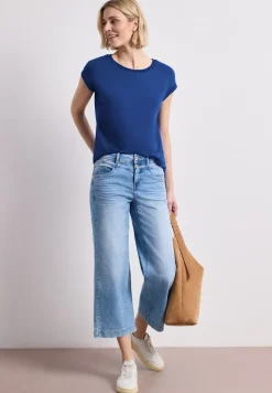 Shirt met boothals en decoratieve tape