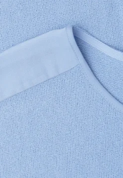 Shirt met boothals en schouderdetails