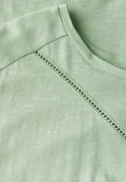Shirt met decoratieve tape