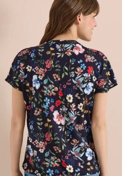 Shirt met gespleten hals en knoopdetails
