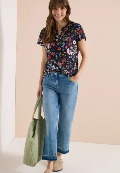 Shirt met gespleten hals en knoopdetails