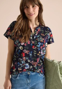 Shirt met gespleten hals en knoopdetails