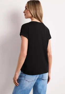 Shirt met gespleten hals en knoopdetails