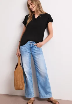 Shirt met gespleten hals en knoopdetails