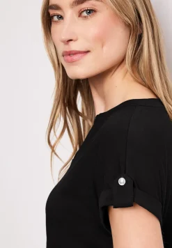 Shirt met gespleten hals en knoopdetails