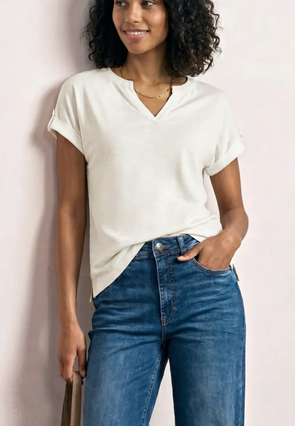 Shirt met gespleten hals en knoopdetails