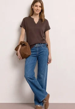 Shirt met gespleten hals en knoopdetails