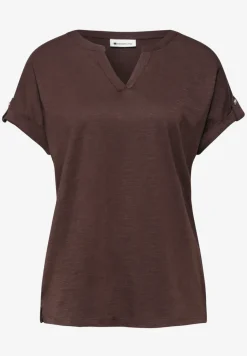 Shirt met gespleten hals en knoopdetails