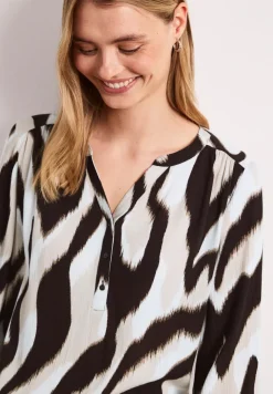 Shirt met gespleten hals en structuurmix