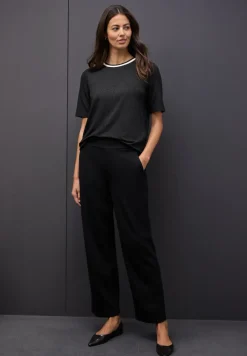 Shirt met glitterdetails