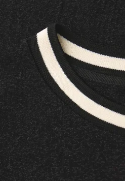 Shirt met glitterdetails