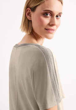 Shirt met hangende schouder en glitter