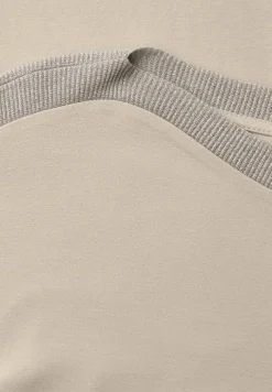 Shirt met hangende schouder en glitter