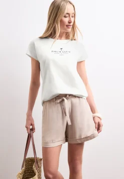 Shirt met hangende schouder en tekst