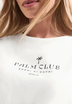 Shirt met hangende schouder en tekst