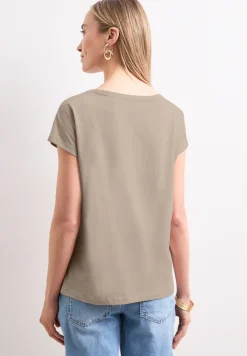 Shirt met hangende schouder en tekst