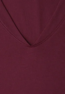 Shirt met hangende schouders en V-hals