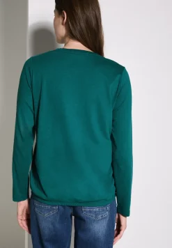 Shirt met knoop in de zoom