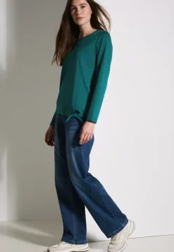 Shirt met knoop in de zoom
