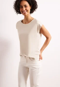 Shirt met overhangende schouder en decoratieve tape