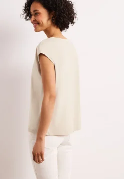 Shirt met overhangende schouder en decoratieve tape