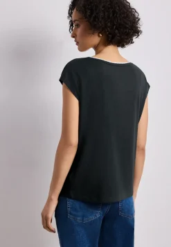 Shirt met overhangende schouder en decoratieve tape