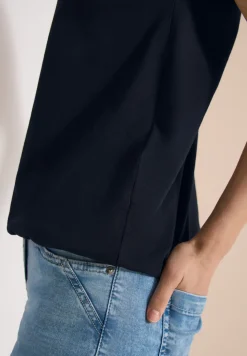 Shirt met overhangende schouders en kanten details