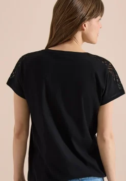 Shirt met overhangende schouders en kanten details