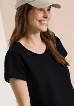 Shirt met overhangende schouders en kanten details