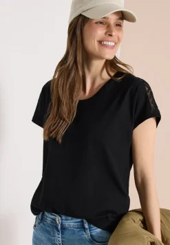 Shirt met overhangende schouders en kanten details