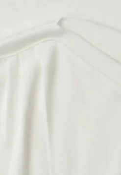 Shirt met overhangende schouders en rimpels