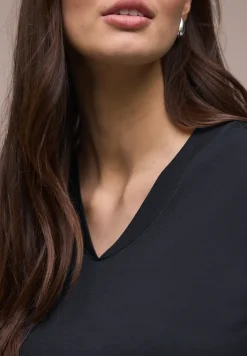 Shirt met overhangende schouders en V-hals