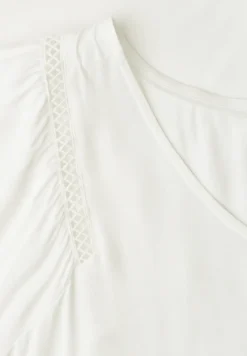 Shirt met overhangende schouders en V-hals