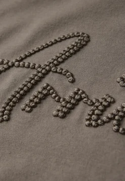 Shirt met tekstborduring