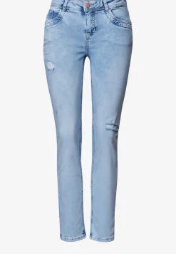 Slim Legs jeans met destroyed details