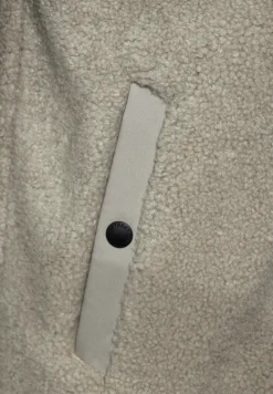 Softshell jas met teddy details