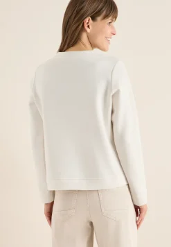 Sweater met borduursel