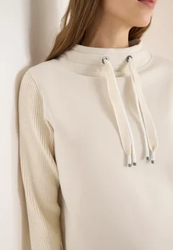 Sweater met gebreide mouwen