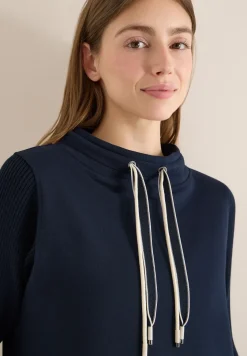 Sweater met gebreide mouwen