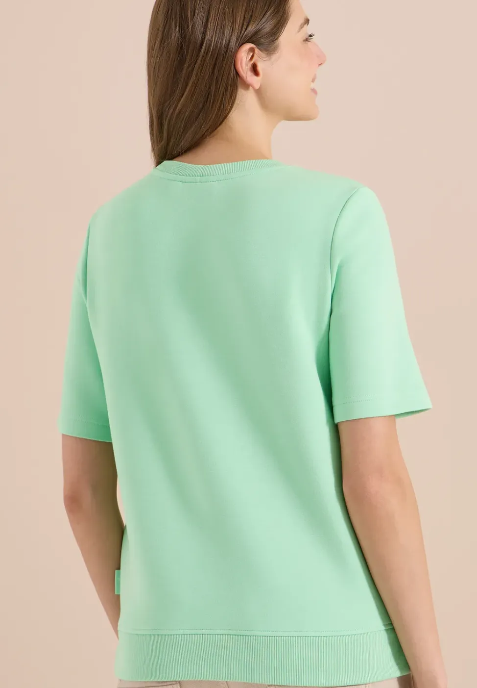 Sweater met korte mouwen en tekst
