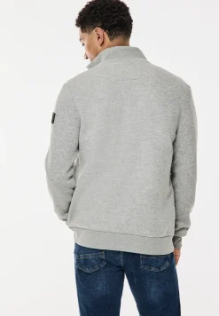 Sweatjack met materiaalmix