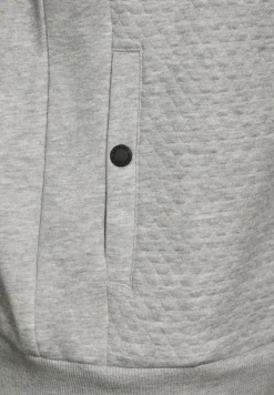 Sweatjack met materiaalmix