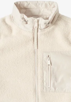 Teddy jas met details