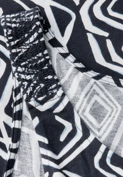 Top met gesmokte details