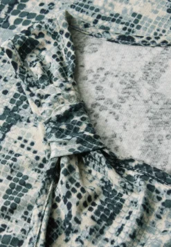 Top met knoopdetail