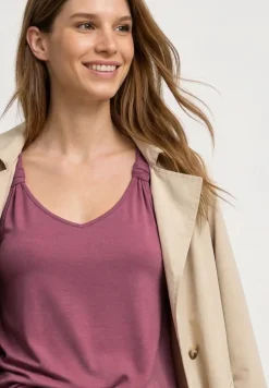 Top met V-hals en knoopdetail
